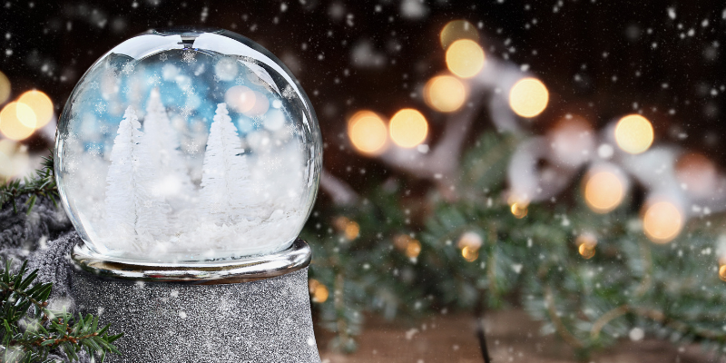 snow globe with snowmen inside, Christmas lights, garland, holiday pet toxins, Animal Emergency & Referral Center of Minnesota